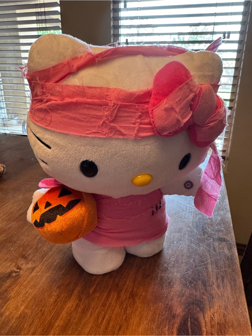 Sanrio Animated Hello Kitty White and Pink Plush with Orange Pumpkin